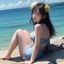 用户海棠旅行家头像，年轻女性旅行者在威尼斯人运河边拍照
